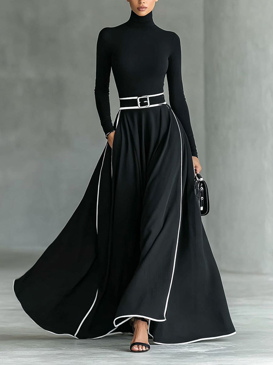 Gina – Vestido Largo Negro con Costuras Blancas y Cuello Alto, Manga Larga, Cintura Ceñida