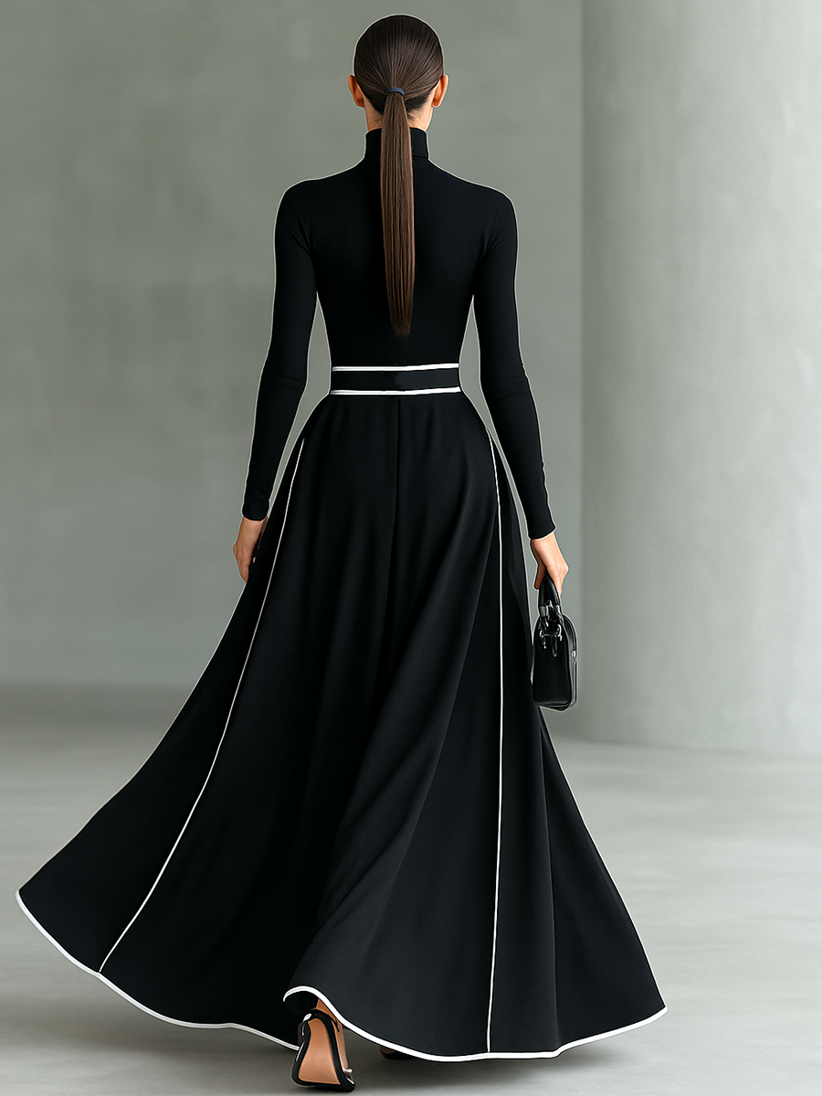 Gina – Vestido Largo Negro con Costuras Blancas y Cuello Alto, Manga Larga, Cintura Ceñida