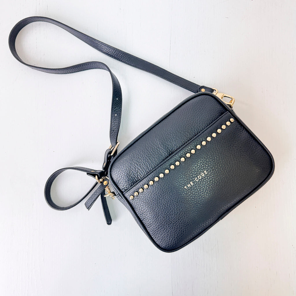 Bandolera tachas negra