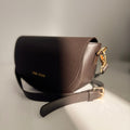 Bandolera marrón testa